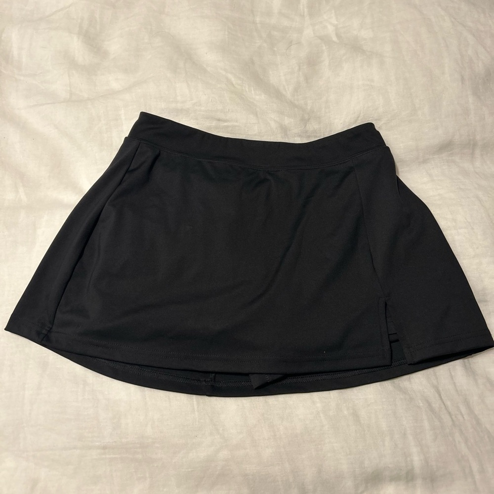 Black mini skirt. Built in shorts. Size s. Athletic material